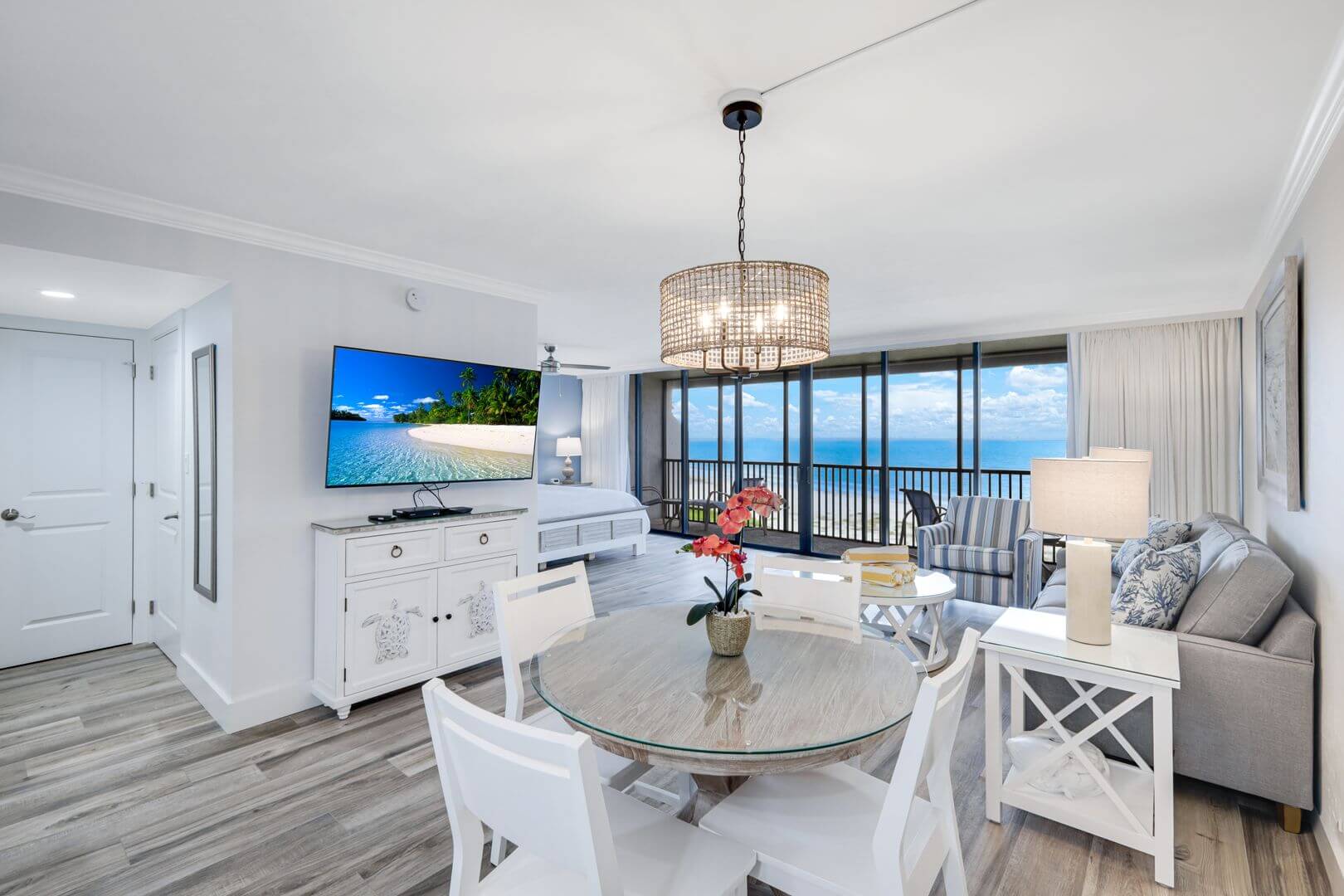 Modern beachfront living room with ocean view.