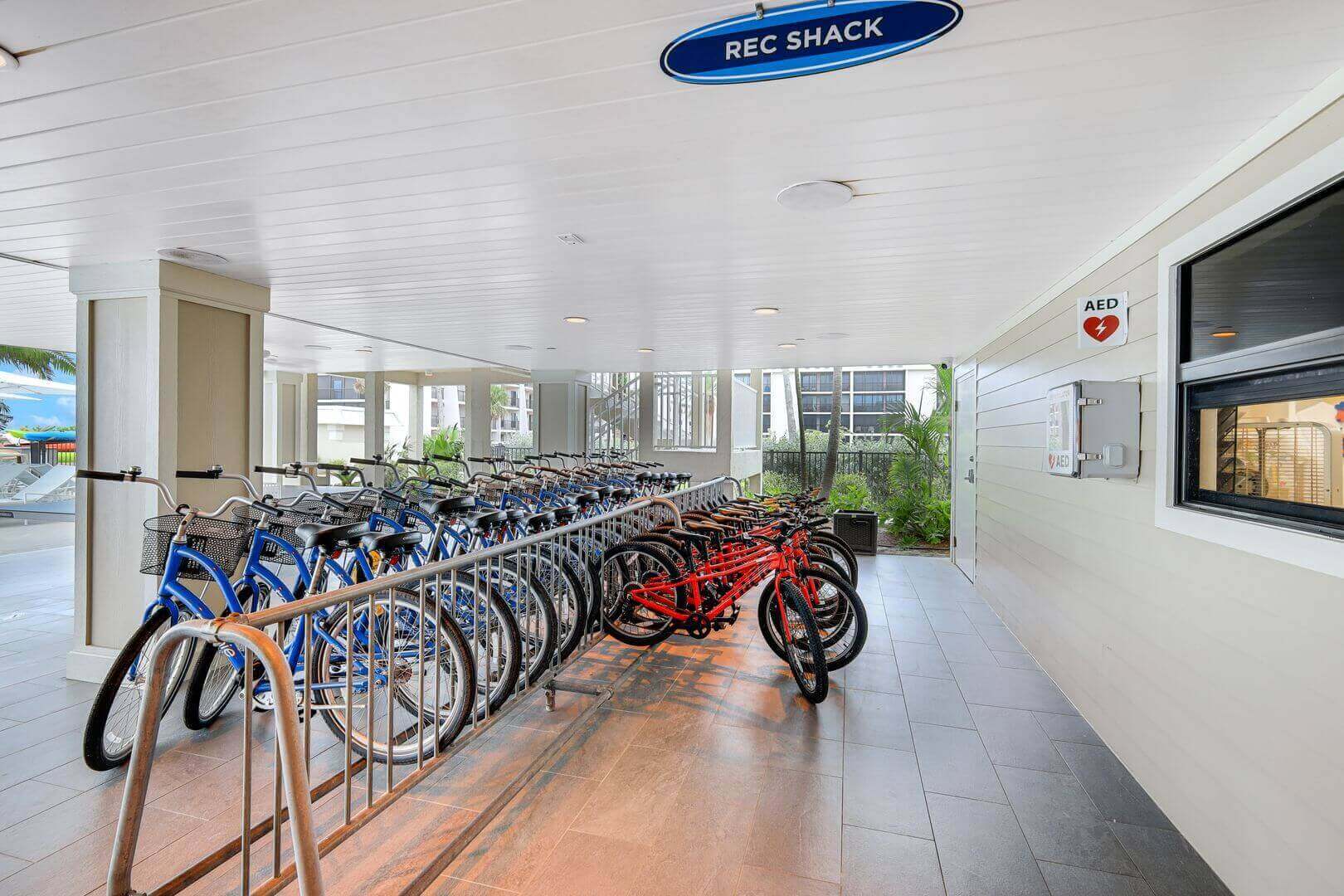Bicycles parked in covered rack area.