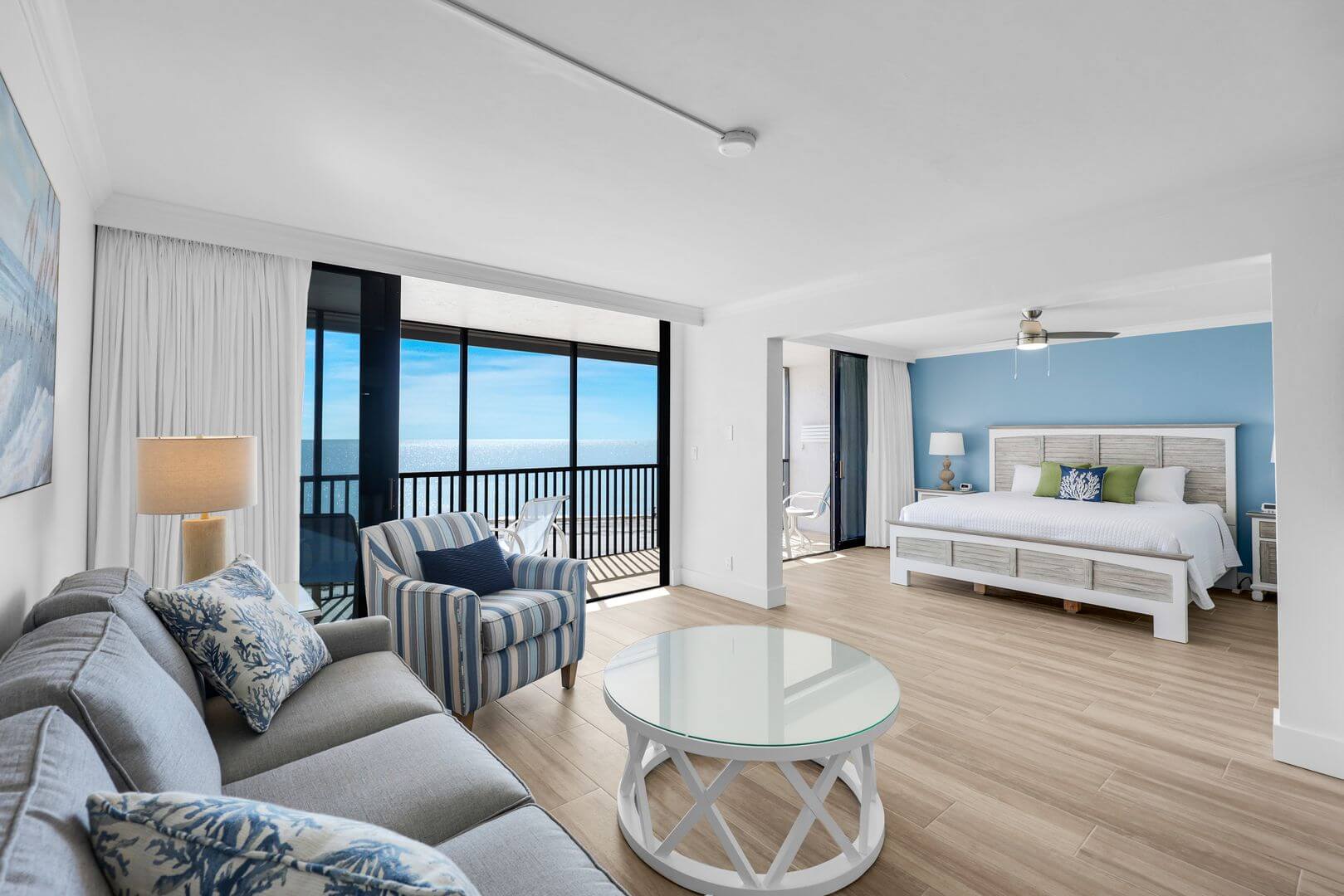 Modern beachfront hotel room with ocean view.