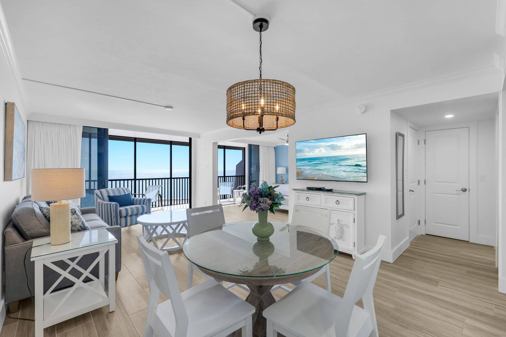 Modern beachfront living room with ocean view.