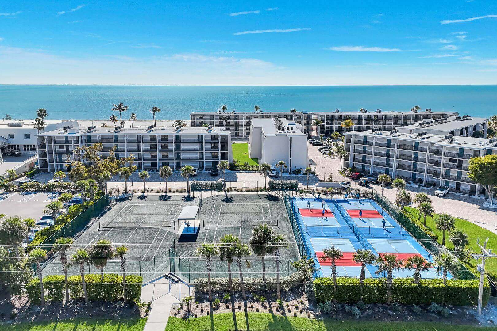 Coastal resort with tennis and pickleball courts.